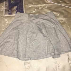 Grey ish skirt.